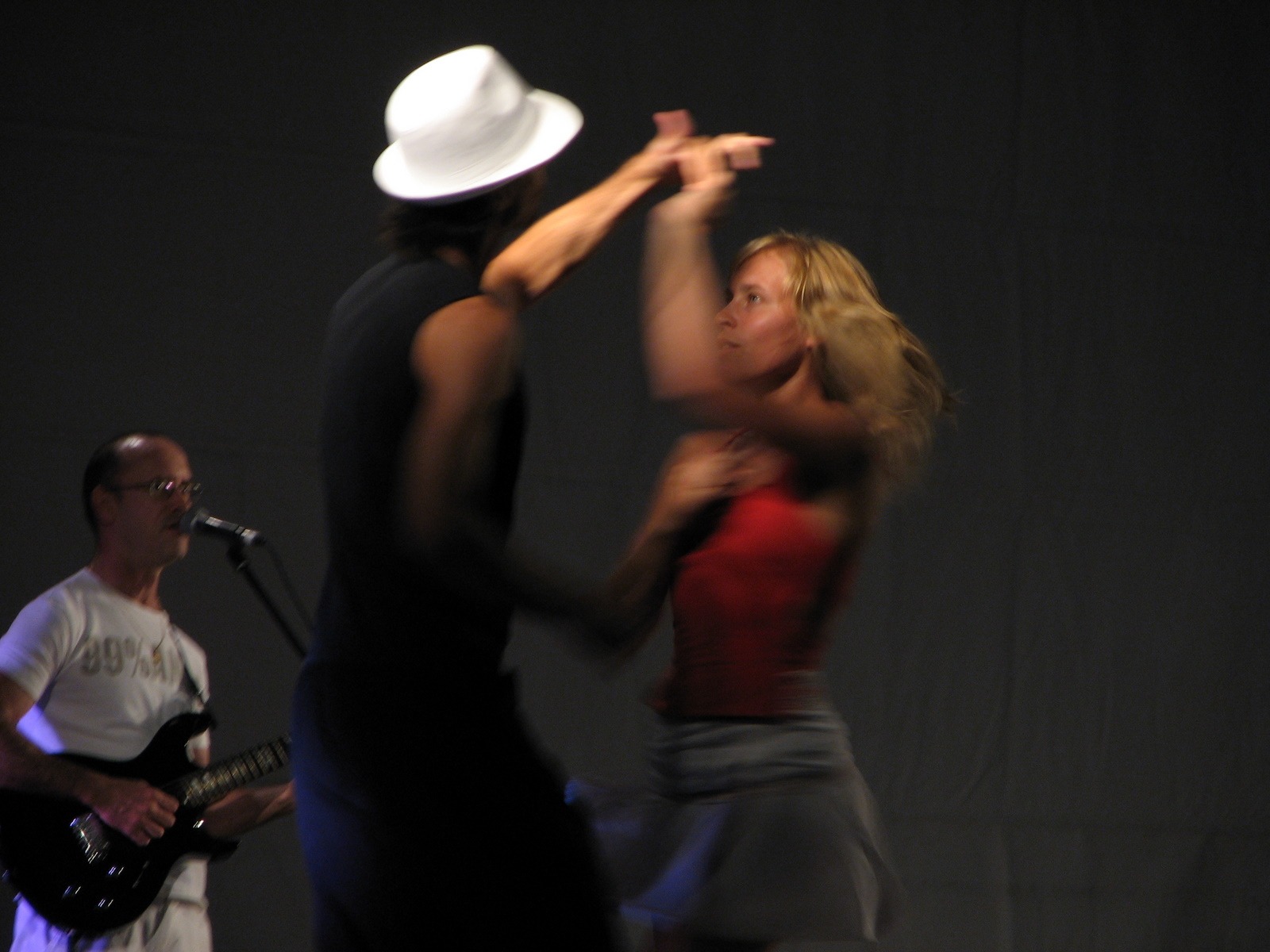 A salsa band and dancers at the Fatacil fair in Lagoa, Portugal.